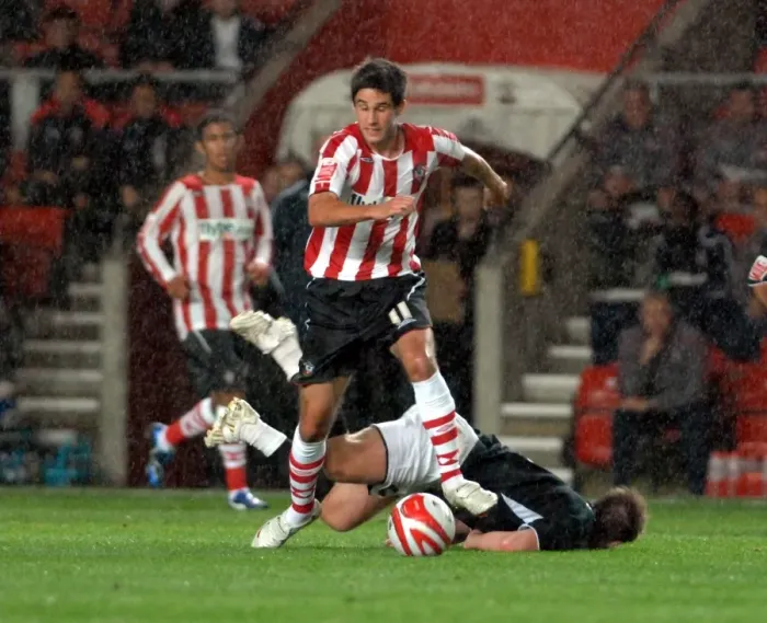 Framed Print : Saints midfielder andy surman escapes david noble after brushing him aside