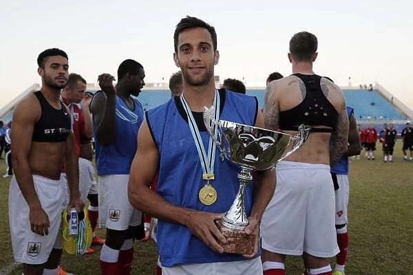 Sam Baldock of Bristol City Holds the Friendship Cup After Victory Against Extension Gunners in Botswana, 2014