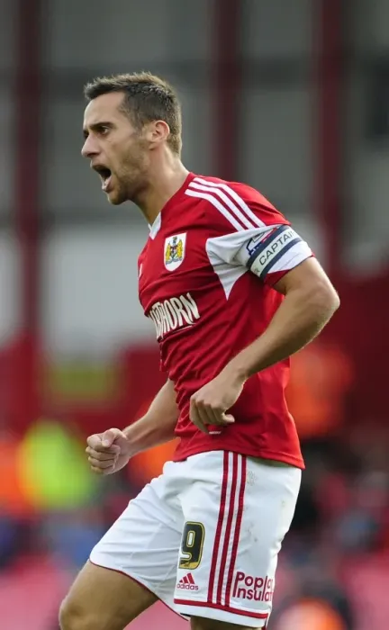 Framed Print : Sam Baldock's Triumphant Goal: Bristol City vs Colchester United (September 2013)