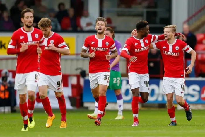 Framed Print : Sam Winnall Scores the Thrilling Equalizer: A Dramatic Moment at Oakwell Stadium