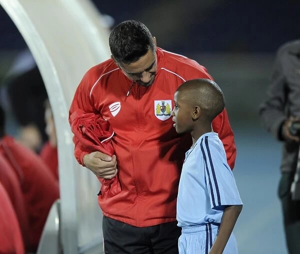 Scott Murray of Bristol City Interacts with a Ball Boy during Botswana Tour Training Session