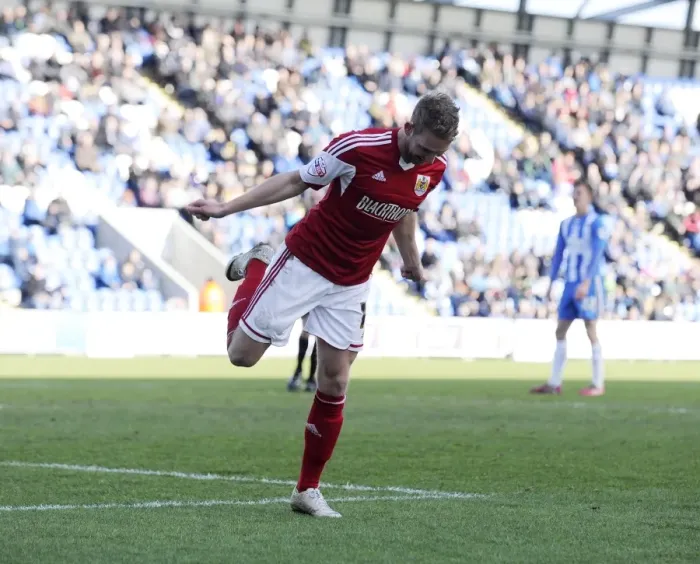 Framed Print : Scott Wagstaff's Euphoric Goal: A Memorable Moment in Colchester United vs. Bristol City (2014)