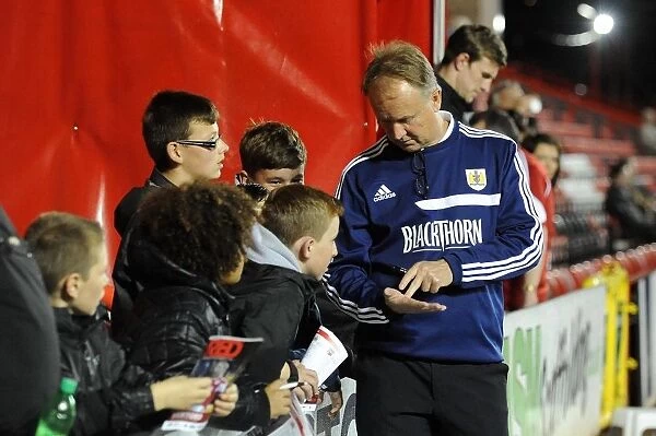 Sean O'Driscoll Engages with Young Fans Before Bristol City vs. Brentford Match
