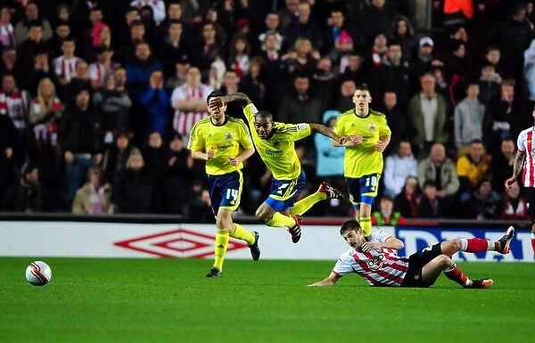 Southampton vs. Bristol City: Marvin Elliott Fouled by Adam Lallana - Championship Football Match, 30 / 12 / 2011