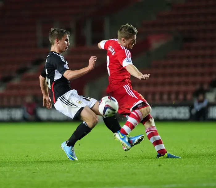 Framed Print : Southampton's Steven Davis Blocks Joe Bryan's Shot in Southampton V Bristol City, Capital One Cup
