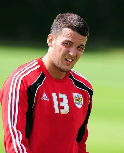 Stephen Henderson's Intense Concentration: A Moment of Focus during Bristol City FC Pre-Season Training