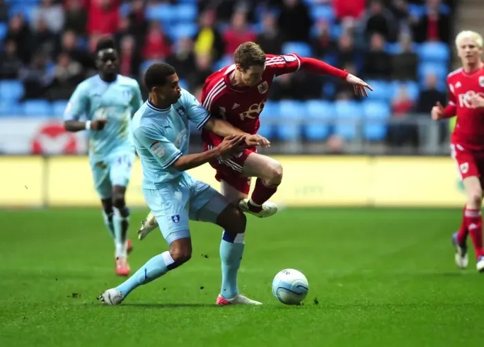 Framed Print : Stephen Pearson vs. Cyrus Christie: Battle for the Ball in Coventry City vs. Bristol City Championship Clash (December 2011) Framed Print : Stephen Pearson vs. Cyrus Christie: Battle for the Ball in Coventry City vs. Bristol City Championship Clash (December 2011)