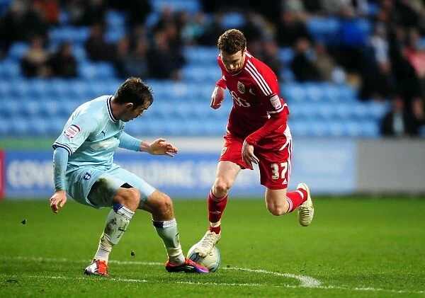 Stephen Pearson vs. Richard Keogh: Intense Battle in Coventry City vs. Bristol City Championship Match, December 2011