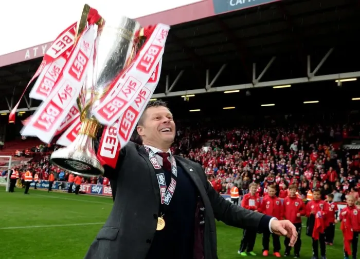 Framed Print : Steve Cotterill Celebrates Double Victory: Sky Bet League One and JPT Trophies with Bristol City