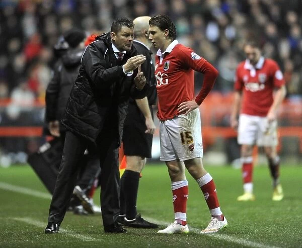Steve Cotterill Conferes with Luke Freeman during Bristol City's Match against Yeovil Town, December 2014