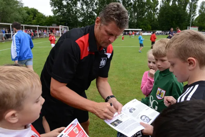 Framed Print : Steve Cotterill Engages with Young Fans at Bristol City FC Pre-Season Friendly Framed Print : Steve Cotterill Engages with Young Fans at Bristol City FC Pre-Season Friendly