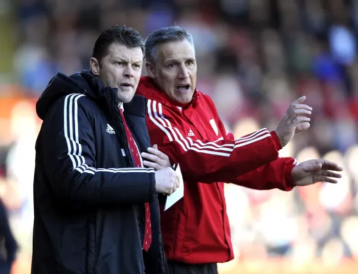 Framed Print : Steve Cotterill and John Pemberton of Bristol City: Pre-Match Huddle vs Swindon Town, March 2014 Framed Print : Steve Cotterill and John Pemberton of Bristol City: Pre-Match Huddle vs Swindon Town, March 2014