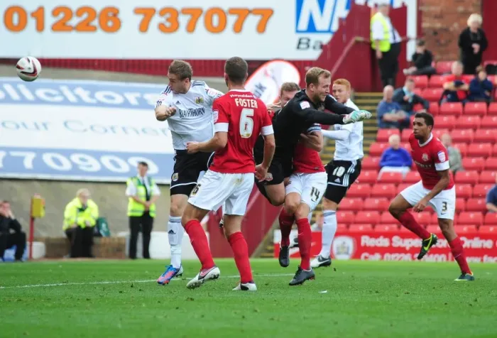 Framed Print : Steven Davies Close Call: A Heading Moment from Barnsley vs. Bristol City Championship Clash Framed Print : Steven Davies Close Call: A Heading Moment from Barnsley vs. Bristol City Championship Clash