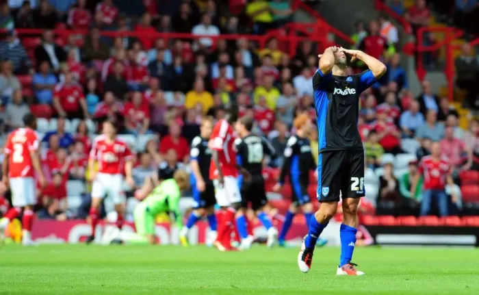 Framed Print : Surprise on the Post: Tal Ben Haim Reacts as Luke Varney's Shot Hits the Woodwork in Bristol City vs. Portsmouth Championship Match (2008-11) Framed Print : Surprise on the Post: Tal Ben Haim Reacts as Luke Varney's Shot Hits the Woodwork in Bristol City vs. Portsmouth Championship Match (2008-11)