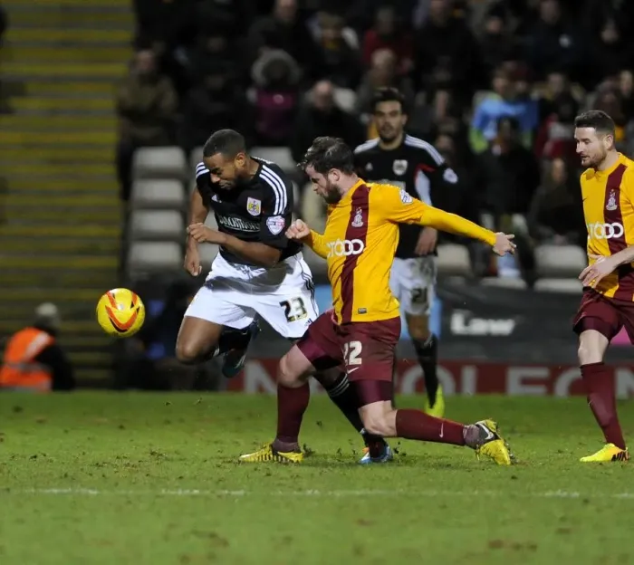 Framed Print : Tackle at Coral Windows Stadium: Tyrone Barnett vs. Matthew Bates in Bradford City vs. Bristol City Football Match, Sky Bet League One (January 11, 2014)