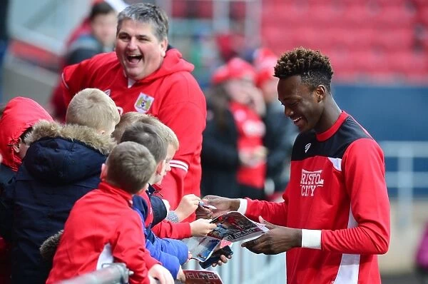 Tammy Abraham of Bristol City Greets Fans with Signatures Amidst Emirates FA Cup Match Against Fleetwood Town