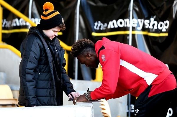 Tammy Abraham of Bristol City Signs Autograph for Wolverhampton Wanderers Fan during Wolverhampton Wanderers v Bristol City Match, Sky Bet Championship, Molineux, Wolverhampton, England, 2016