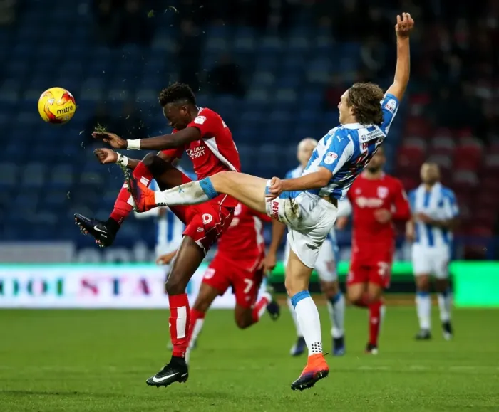 Framed Print : Tammy Abraham vs Michael Hefele: Intense Battle at Huddersfield Town vs Bristol City (Sky Bet Championship) Framed Print : Tammy Abraham vs Michael Hefele: Intense Battle at Huddersfield Town vs Bristol City (Sky Bet Championship)