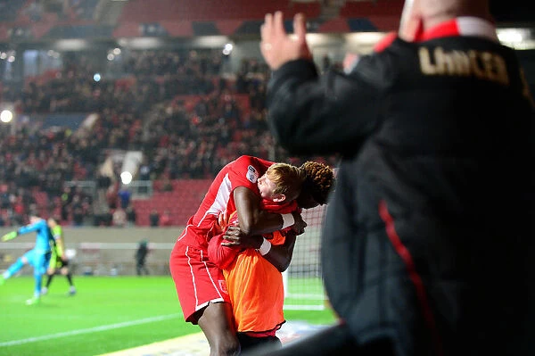 Tammy Abraham's Epic Goal Celebration with a Ball Boy: A Thrilling Moment at Ashton Gate (Bristol City vs. Huddersfield Town, Sky Bet Championship - March 17, 2017)