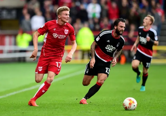 Framed Print : Taylor Moore Drives Forward in Sky Bet Championship Clash: Bristol City vs. Nottingham Forest Framed Print : Taylor Moore Drives Forward in Sky Bet Championship Clash: Bristol City vs. Nottingham Forest