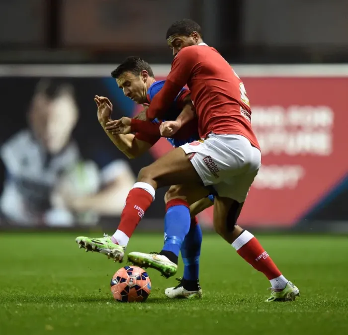 Framed Print : A Tense Moment: Enda Stevens and Mark Little Clash in FA Cup Third Round Replay Between Bristol City and Doncaster Rovers