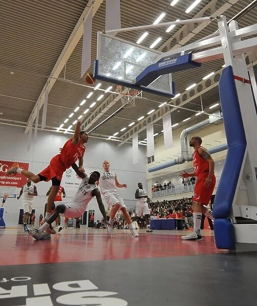 A Tense Showdown: Bristol Flyers vs. Manchester Giants in the British Basketball League at SGS Wise Campus (December 2014)