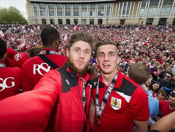 Thousands Gather for Bristol City Celebration Tour: Joe Bryan and Wes Burns Amidst Cheering Fans