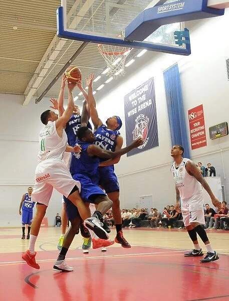 Thrilling British Basketball League Match: Flyers vs. Raiders at SGS Wise Campus (September 2014)
