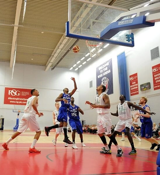 Thrilling British Basketball League Match: Flyers vs. Raiders at SGS Wise Campus (September 2014)