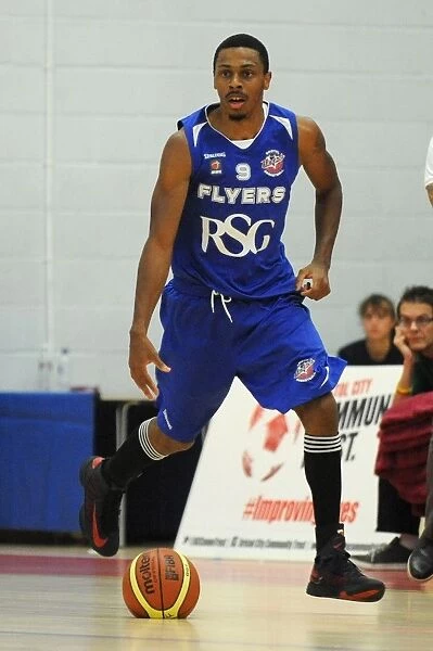 Thrilling British Basketball League Showdown: Bristol Flyers vs. Plymouth Raiders at SGS Wise Campus (September 2014)