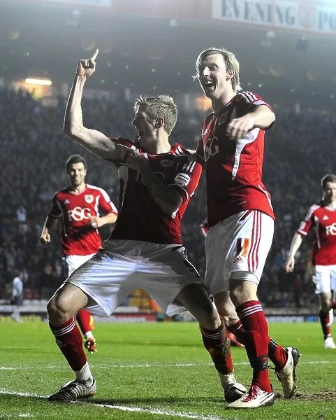 Thrilling Goal Celebration: Jon Stead and Martyn Woolford of Bristol City after Scoring against Cardiff City at Ashton Gate Stadium (March 10, 2012)