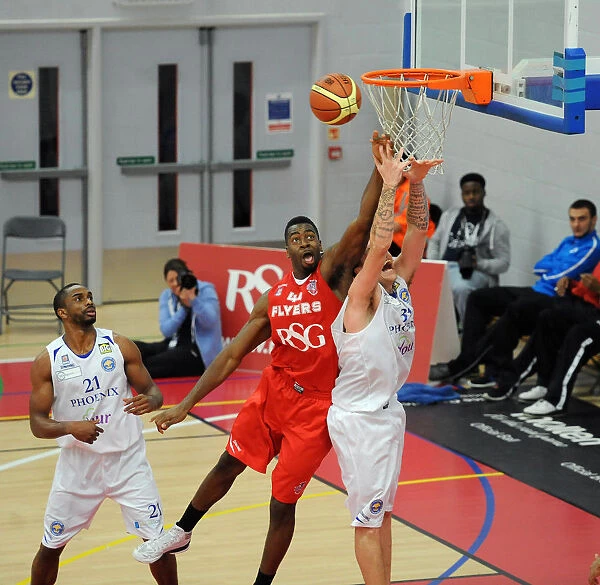 Thrilling Moment: Alif Bland of the Bristol Flyers Soars for the Basketball