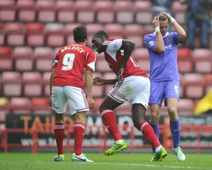 Framed Print : Thrilling Moment: Jay Emmanuel-Thomas's Goal Celebration for Bristol City in Sky Bet League One Match against Wolves, 2013 Framed Print : Thrilling Moment: Jay Emmanuel-Thomas's Goal Celebration for Bristol City in Sky Bet League One Match against Wolves, 2013