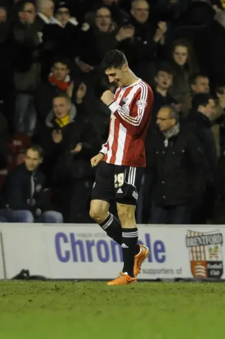 Framed Print : Thrilling Moment: Marcello Trotta's Goal Celebration for Bristol City in Brentford Clash, January 2014