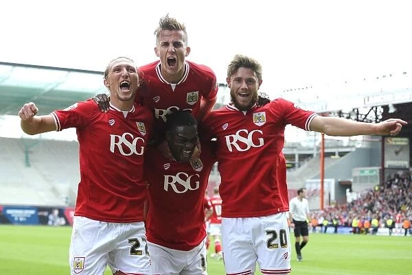 Triumphant Moment: Agard, Ayling, Bryan, and Burns Celebrate Double Goal Lead for Bristol City against Walsall