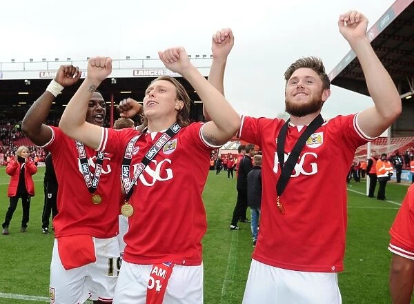 Triumphant Moment: Agard, Freeman, and Burns Celebrate Bristol City's Victory over Walsall