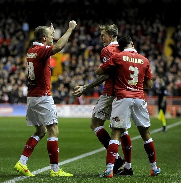 Triumphant Threesome: Aden Flint, Derrick Williams, and Aaron Wilbraham Celebrate Double Delight for Bristol City Against Bradford City