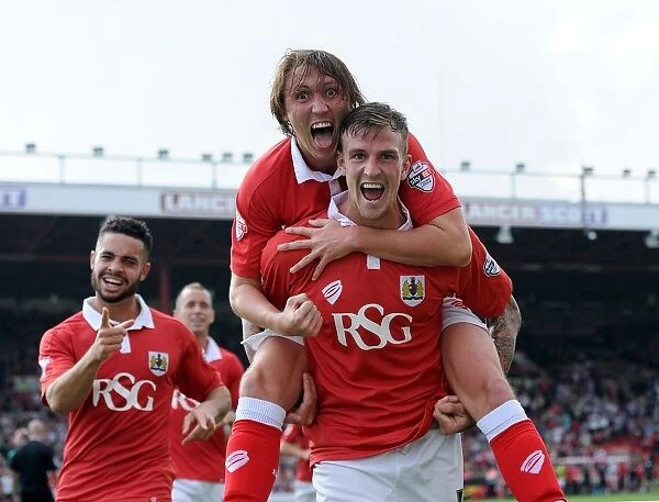 Triumphant Threesome: Aden Flint, Luke Ayling, and Derrick Williams Celebrate Bristol City's Goal vs Scunthorpe United