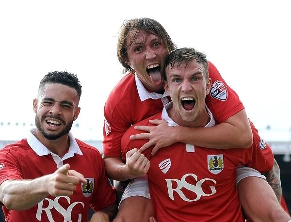 Triumphant Threesome: Aden Flint, Luke Ayling, and Derrick Williams Historic Goal Celebration (Sept 6, 2014): Bristol City's Victory over Scunthorpe United