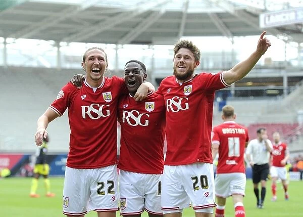 Triumphant Threesome: Agard, Ayling, and Burns Celebrate Double for Bristol City against Walsall