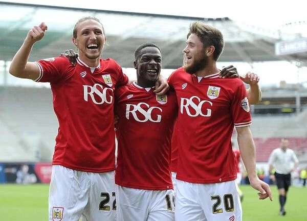 Triumphant Threesome: Agard, Ayling, and Burns Celebrate Double Delight in Bristol City's Promotion Push (3 May 2015)