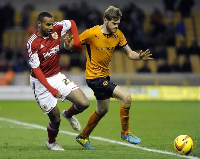 Framed Print : Tyrone Barnett Goes Head-to-Head with Wolverhampton Wanderers in Sky Bet League One Clash Framed Print : Tyrone Barnett Goes Head-to-Head with Wolverhampton Wanderers in Sky Bet League One Clash