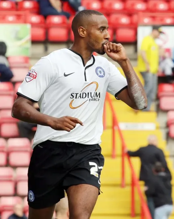 Framed Print : Tyronne Barnett's Thrilling Goal Celebration: A Football Moment at Ashton Gate