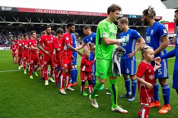Unforgettable Moment: Bristol City Mascots and Birmingham City Players Heartwarming Handshake at Ashton Gate Stadium, Sky Bet Championship (07 / 05 / 2017)