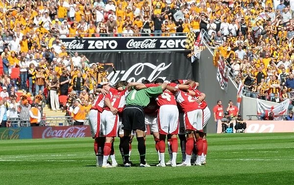 United in Determination: The Moment of Focus - Bristol City Football Team's Play Off Final Huddle