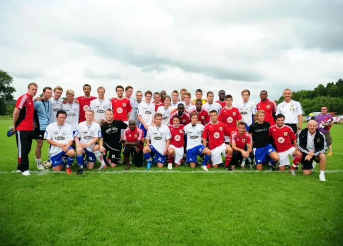 Framed Print : United in Football: A Historic Team Photo of Bristol City and Vallens Players Framed Print : United in Football: A Historic Team Photo of Bristol City and Vallens Players