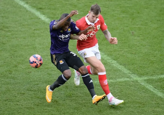 Framed Print : Valencia Steals the Ball from Flint in Intense Bristol City vs West Ham United FA Cup Clash