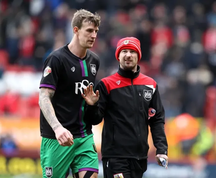 Framed Print : Wade Elliott Consults Aden Flint: Intense Moment at The Valley during Charlton Athletic vs. Bristol City (Sky Bet Championship)