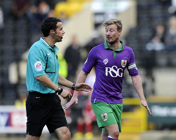 Wade Elliott in Discussion with Referee during Notts County vs. Bristol City Match, Sky Bet League One (August 2014)