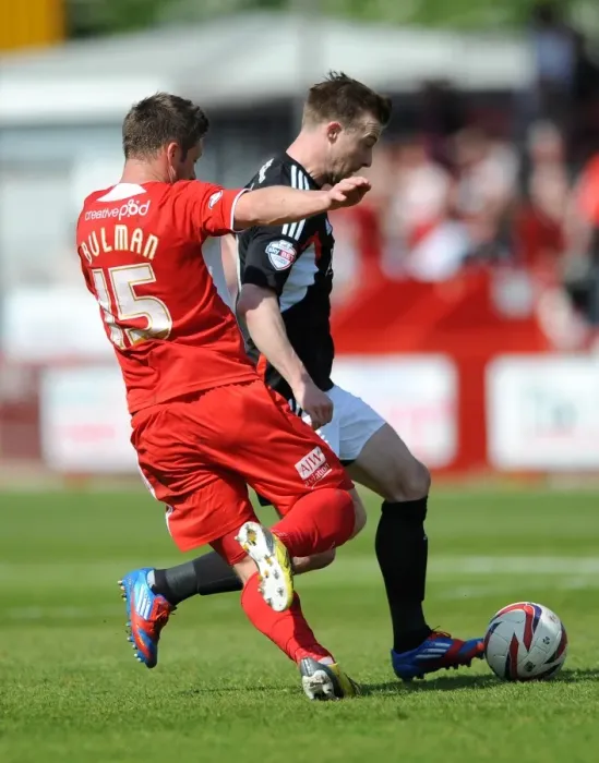 Framed Print : Wade Elliott Holds Firmly Against Crawley Town Pressure: A Moment from the Crawley Town vs. Bristol City Football Match, May 3, 2014